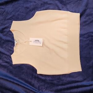 Endless Rose cream coloured sleeveless sweater.